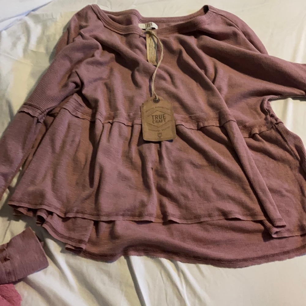 long sleeve peplum style top